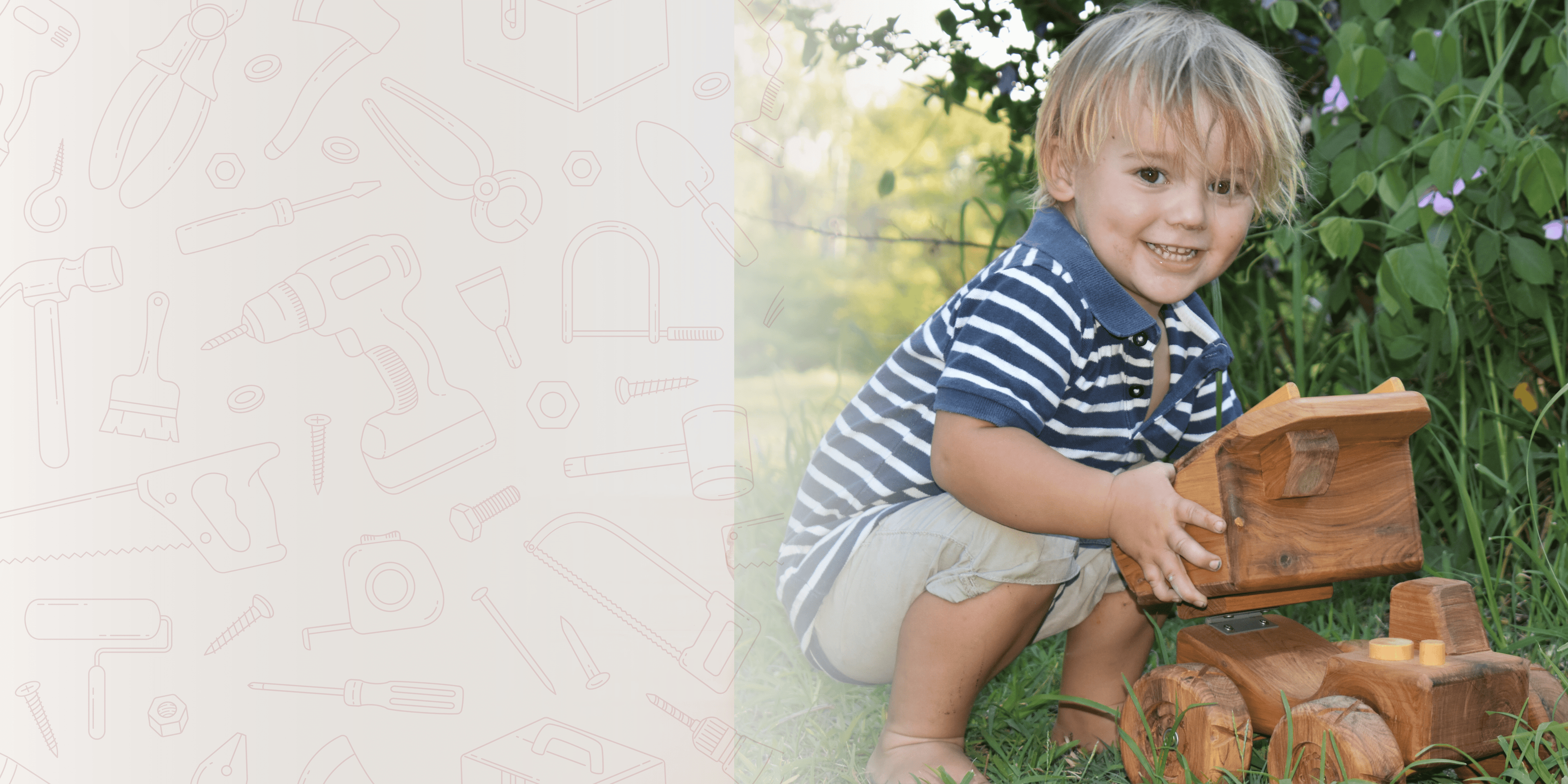 A young boy happily playing with Heirloom Handmade Wooden Dump Truck. Luxury, exclusive. 