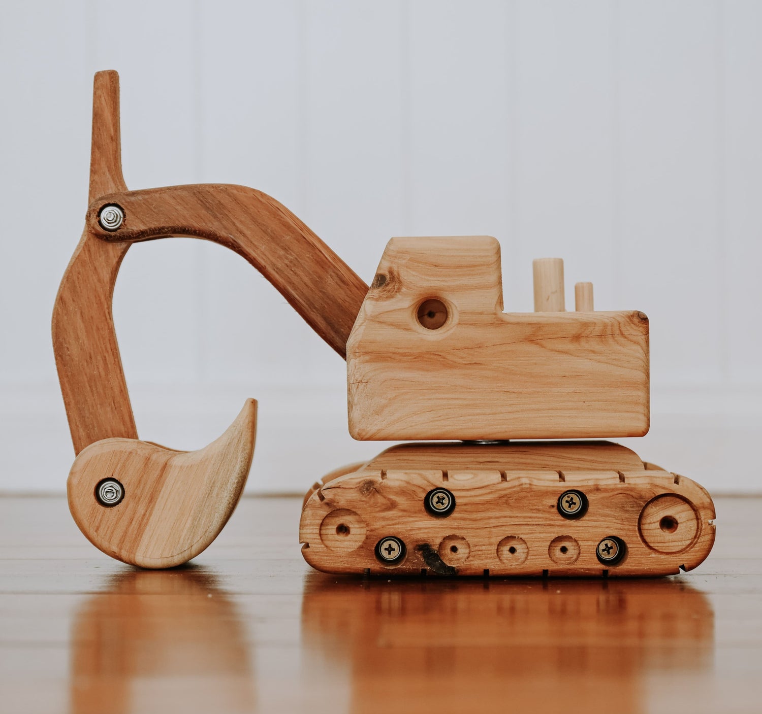 A prestigious handbuilt wooden excavator in a luxury queenslander home