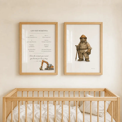 Two framed personalized firefighter-themed nursery prints hanging on a beige wall above a light wood crib. The left print is a custom birth chart for 'Leo Ted McKenna' with a small excavator illustration, and the right print shows a excavator bear holding an axe.