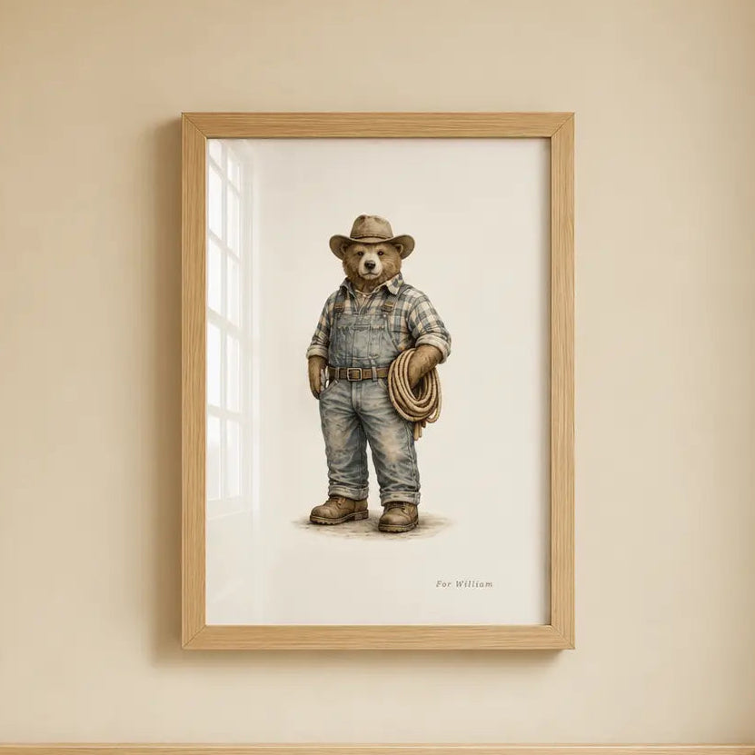A framed art print of a Heritage Farmer bear wearing blue denim overalls and a hat, hanging on a beige wall above a light wood crib. Tractor Farmer Bear