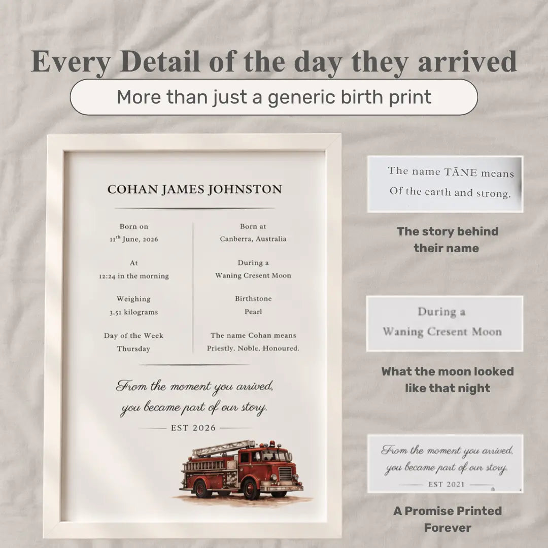 A framed personalized birth announcement print displayed on a light textured background. The white frame contains a typographic memorial-style design with the name 'COHAN JAMES JOHNSTON,' birth details, a quote, and a small red fire truck illustration. fire truck